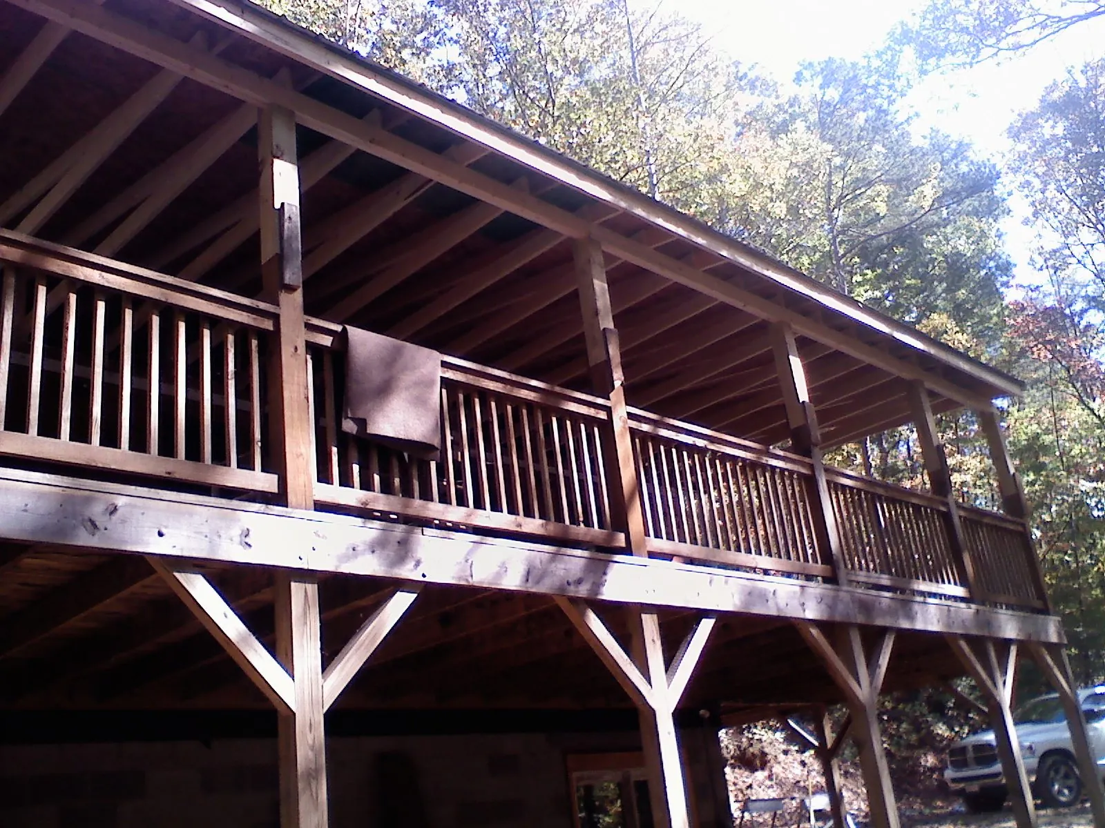 Timber framing under a new elevated porch and deck — Roof Leak Repair in Ririe by Roofing Brothers